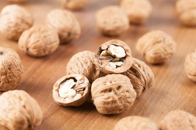 Close-up of walnuts on wooden table
