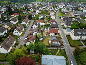 High angle view of townscape and trees in town