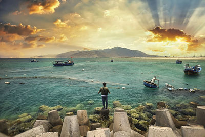 Scenic view of sea against sky during sunset