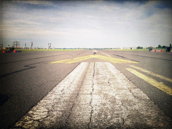 Road against cloudy sky