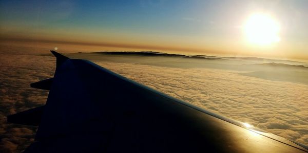 Scenic view of beach against sky during sunset