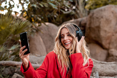 Young woman using mobile phone