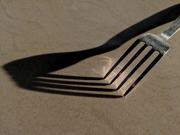 High angle view of fork on floor