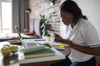 Black student studying at home