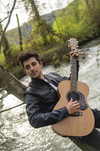 Young man playing guitar