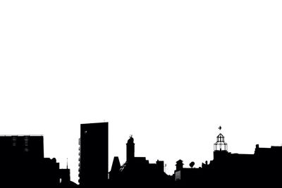 Silhouette of buildings against sky