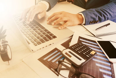 Man using laptop on table