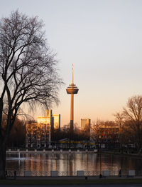 Scenic view of river against sky during sunset