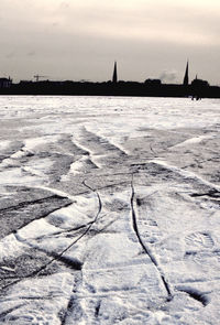 Scenic view of sea against sky during winter