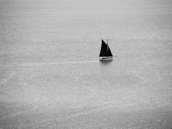 Sailboat sailing in sea