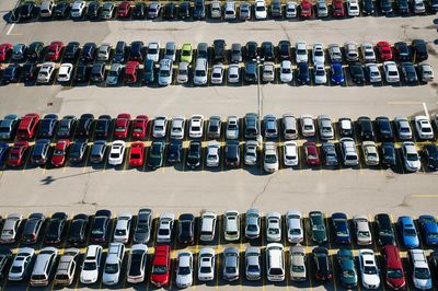 High angle view of cars parked in parking lot