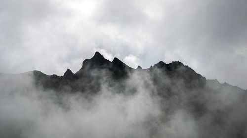 Low angle view of mountains against sky