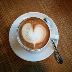 Close-up of cappuccino on table