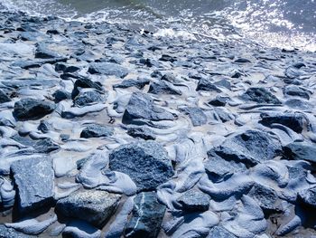 High angle view of frozen sea shore