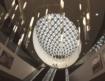 Low angle view of illuminated chandelier