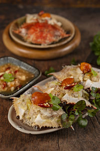 Close-up of pizza served on table