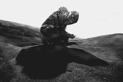 Rear view of person on sand