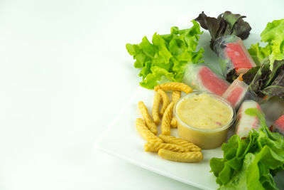 Close-up of food over white background