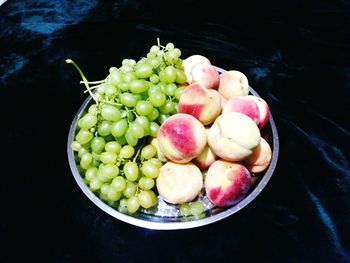 High angle view of fruits in bowl on table