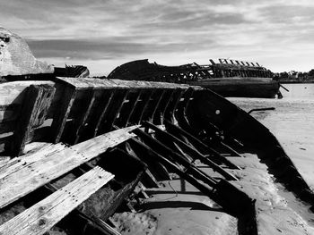 Boats moored on sea against sky