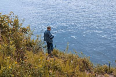 Man fishing in sea