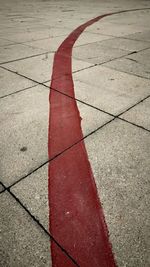 High angle view of zebra crossing on tiled floor