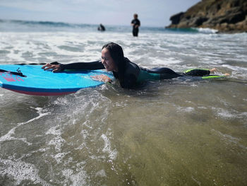 Boy enjoying in sea