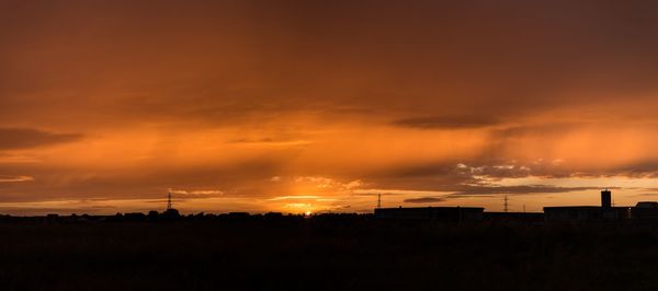 Scenic view of dramatic sky during sunset