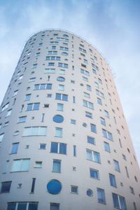 Low angle view of skyscraper against sky