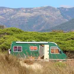 Motor home against mountains