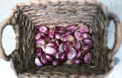 High angle view of garlic in basket