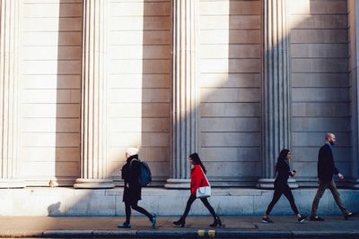 People walking on zebra crossing