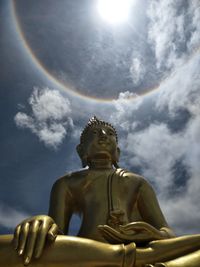Low angle view of statue against sky