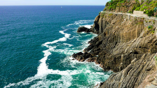 Scenic view of sea shore against sky