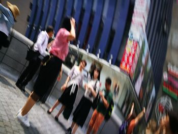 High angle view of people walking on street