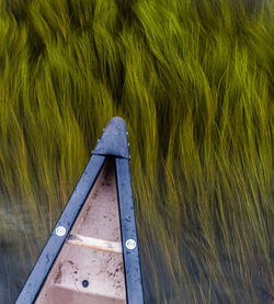 High angle view of metallic structure on grass