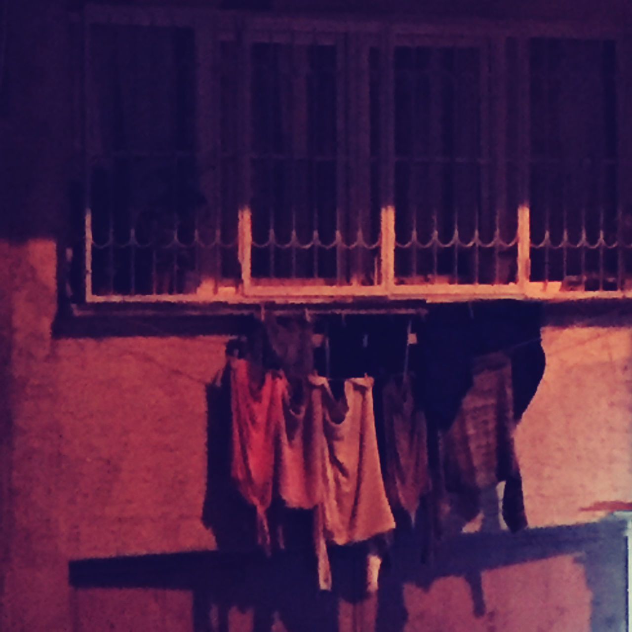 CLOTHES DRYING OUTSIDE BUILDING