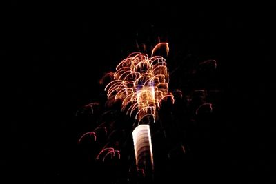 Firework display at night