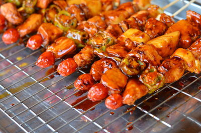 Close-up of meat on barbecue grill