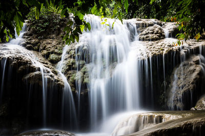 Scenic view of waterfall in forest