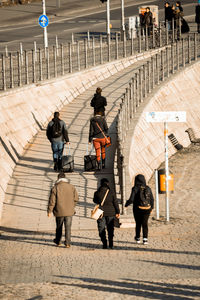 People walking on zebra crossing