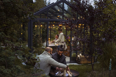 Friends talking in garden