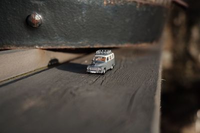 Close-up of car on road