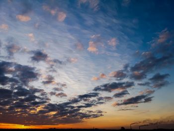 Low angle view of dramatic sky during sunset