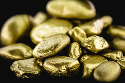 Close-up of candies against black background