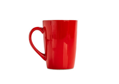 Close-up of coffee cup against white background