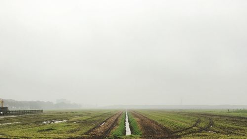 View of field against clear sky