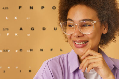 Portrait of smiling young woman