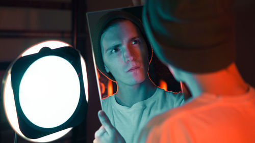 Portrait of young man looking away