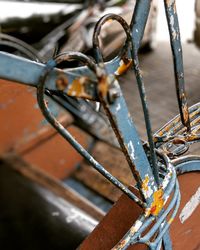 Close-up of rusty chain on boat